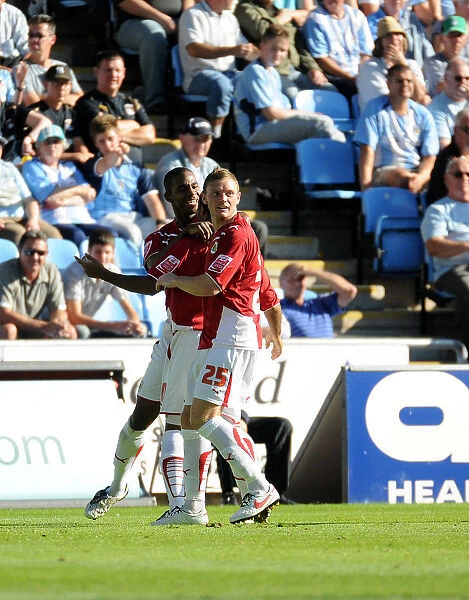 Liam Fontaine and Brian Wilson smother Nicky Maynard after his equalizer