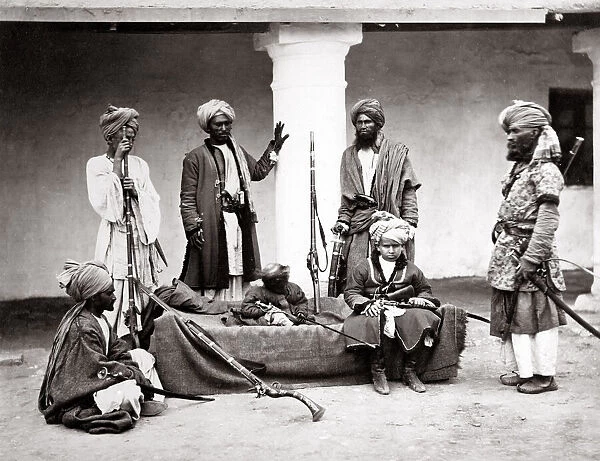 c. 1860s India - tribal warrior group with child and monkey