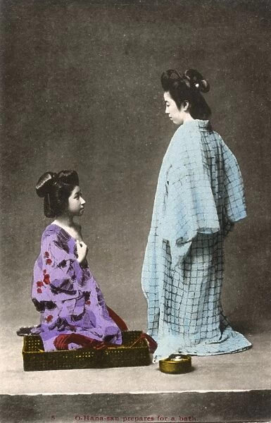 Japan - Japanese woman O-Hana-San prepares for a bath