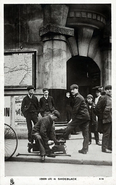 London Life - A Shoeblack works outside a Station Entrance on The City and South London Railway (C&SLR), the tunnels and lines of which now form the Bank Branch of the Northern line, Date: circa 1910s