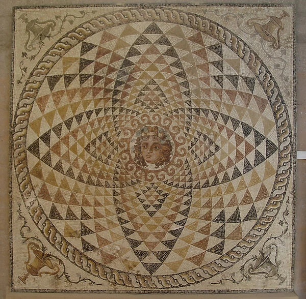 Roman mosaic with Dyonysius head