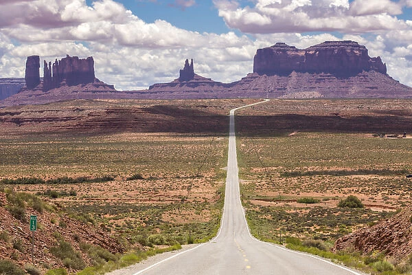 USA, Utah, Monument Valley Navajo Tribal Park. Road through park landscape. Credit as