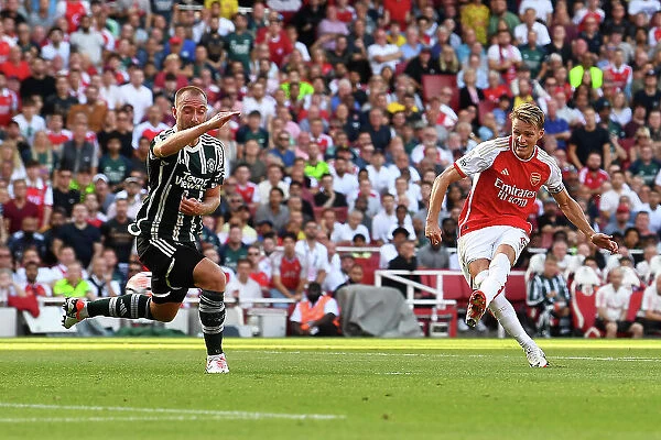 Arsenal Takes the Lead: Martin Ødegaard Scores First Goal Against Manchester United (2023-24)