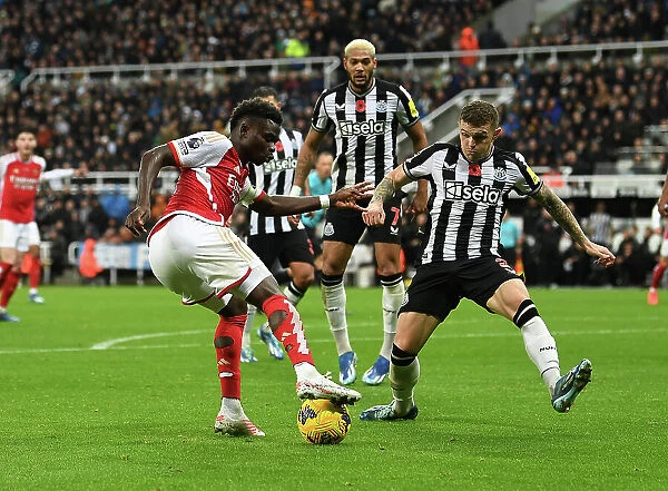 Bukayo Saka Takes on Kieran Trippier: Intense Battle at St. James Park - Arsenal vs Newcastle United (2023-24)