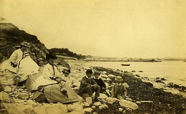 Swanage. August 1863: A family on the beach at Swanage