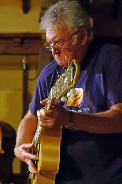 Jim Mullen, Scottish jazz guitarist, The Woodman, Ide Hill, Kent, 2012. Artist: Brian O Connor