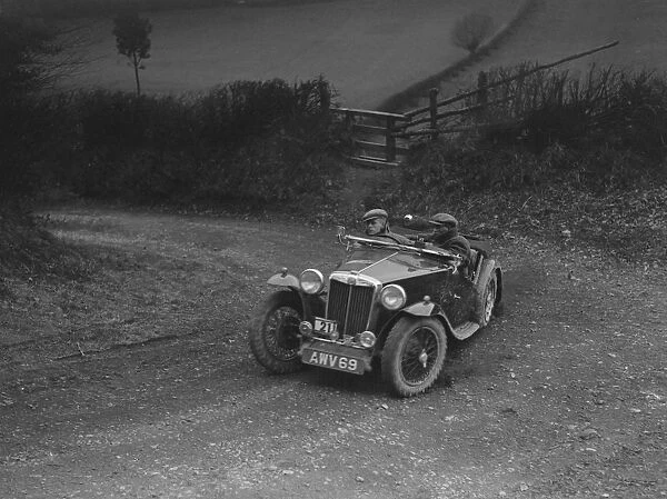 MG TA of HV Slade competing in the MG Car Club Midland Centre Trial, 1938. Artist: Bill Brunell