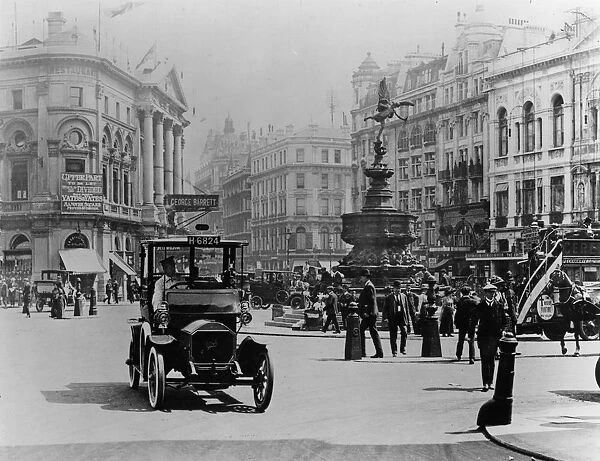 Unic taxi in Piccadilly circus, London circa 1910. Creator: Unknown