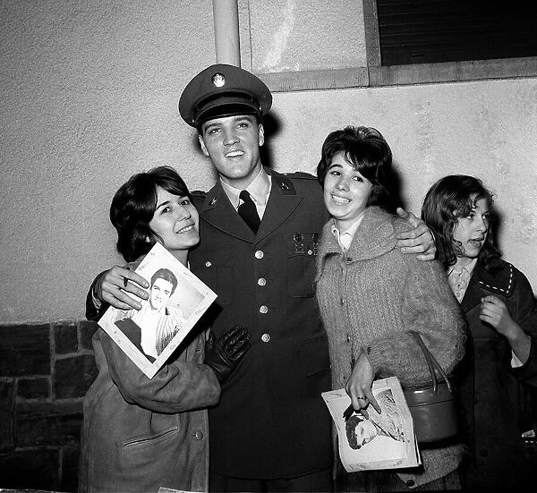 Elvis Presley with fans before press conference in Germany, March 1960