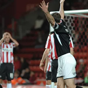 Jamie McCombe appeals for the penalty which