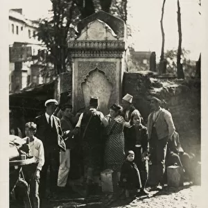 Hamidiye Cesmesi (Hamideh Fountain), Istanbul, Turkey - in and around the Galata Tower on the Galip dede Street (across the Serdar-i ekrem street). Date: 1922