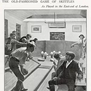Men playing Skittles inside in the East End, London pub. Date: 1903