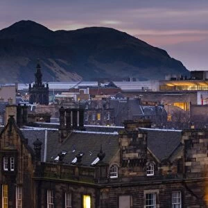 Scotland, Edinburgh, Old Town. View overlooking the Old Town towards the extinct volacano known as Arthur s