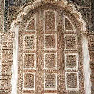 Carved arched door in the 19th century Prataspeswar terracotta temple, built in 1849, in the temple complex, Kalna, West Bengal, India, Asia