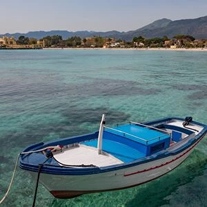 Traditional colourful fishing boat moored at the seaside resort of Mondello, Sicily