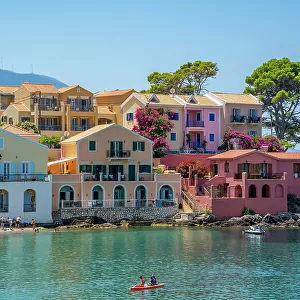 View of harbour and colourful houses in Assos, Assos, Kefalonia, Ionian Islands, Greek Islands, Greece, Europe