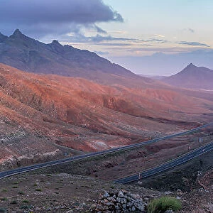 View of road and mountains from Astronomical Viewpoint Sicasumbre at sunset, Pajara, Fuerteventura, Canary Islands, Spain, Atlantic, Europe