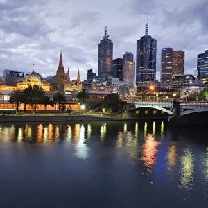 Australia, Victoria, Melbourne. Yarra River and city skyline by night
