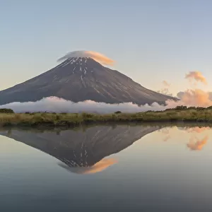 Reflection of Mount Taranaki at sunset. Egmont National Park, New Plymouth district
