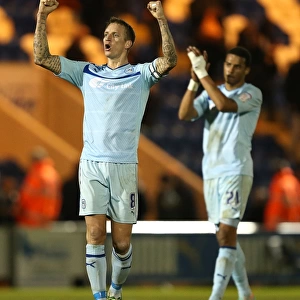Coventry City FC: Celebrating Promotion - Baker and Christie's Triumphant Moment after Winning against Colchester United in Npower League One
