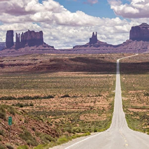 USA, Utah, Monument Valley Navajo Tribal Park. Road through park landscape. Credit as
