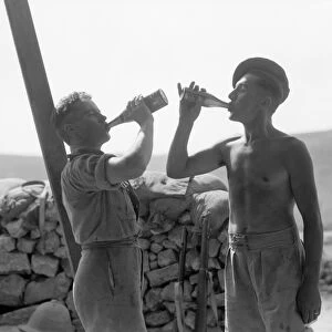 BRITISH MILITARY CAMP. British soldiers drinking beer at the Lubban Camp in the