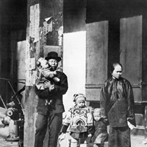 CHINESE IMMIGRANTS. A family outing in San Franciscos Chinatown: photographed, c