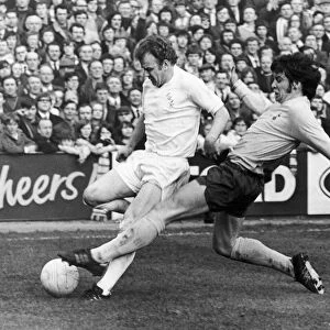 ENGLAND: SOCCER MATCH, 1972. Soccer match between Leeds United and Tottenham Hotpur during the FA Cup, 18 March 1972. Leeds captain Billy Bremner is tackled by Cyril Knowles