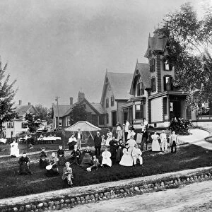 FAMILY REUNION, 1895. The Brooks family gathered on the front lawn during a family renunion