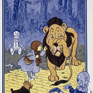 WONDERFUL WIZARD OF OZ. Dorothy and the Cowardly Lion. Drawing from 1st edition, 1900, of L