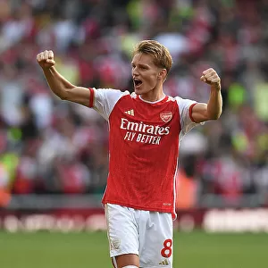 Arsenal Triumphs Over Manchester United in the 2023-24 Premier League: Martin Ødegaard's Celebration