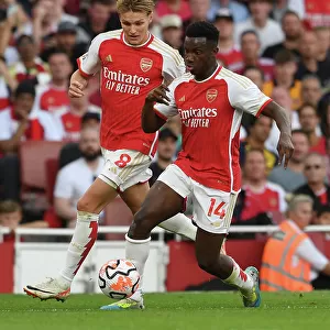 Arsenal's Nketiah and Odegaard Face Off Against Manchester City in 2023-24 Premier League
