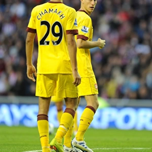 Laurent Koscielny and Marouane Chamakh (Arsenal). Sunderland 1: 1 Arsenal