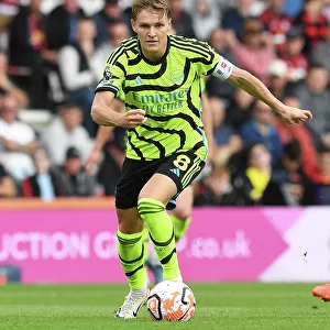 Martin Odegaard Shines: Arsenal's Midfield Genius Guides Team to Premier League Win Against AFC Bournemouth