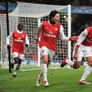 Theo Walcott and Samir Nasri: Arsenal's Dynamic Duo Celebrates Goal in Arsenal 3-1 Victory over Partizan Belgrade, UEFA Champions League, Emirates Stadium