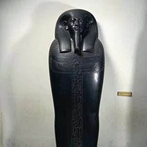 Egypt, Sais, Front of mummy-shaped sarcophagus of the vizier Gemenefherbak, twenty-sixth dynasty, late period, circa 600 B. C. black basalt