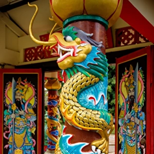 A Dragon Carving on a Pillar in Wat Hainan Temple Nathon, Ko Samui District, Surat Thani, Thailand