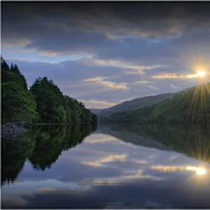 The first light of dawn on the Fillan River, highlands of Scotland
