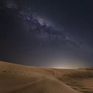 Sand dunes with stars and milkyway above