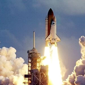 Space Shuttle Atlantis roars into space on mission STS-106