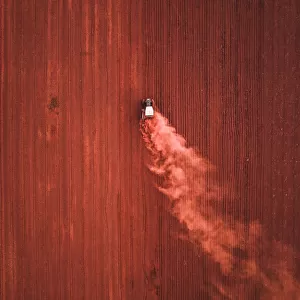 Tractor in an agricultural field photographed from above, Queensland, Australia