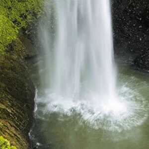 Surge of water falling into a lake, Bridal Veil Falls, Raglan, Waikato, North Island, New Zealand