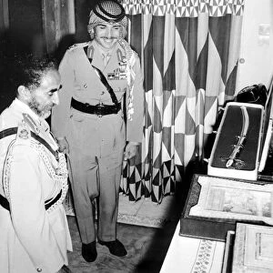 Amman, Jordon: Emperor Haile Selassie of Ethiopia admires a selection of gifts presented