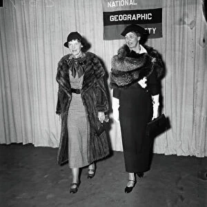 Amelia Earhart arrives with Eleanor Roosevelt to address the members of the National Geographic Society, 1935 (b/w photo)