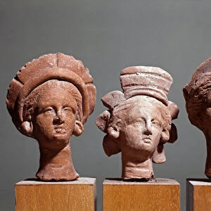 Art of Great Greece: heads of votive statuettes of terracotta from the temple of Ceres a