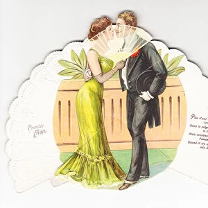 A Victorian die cut greeting card in the shape of a fan with an image of a a man