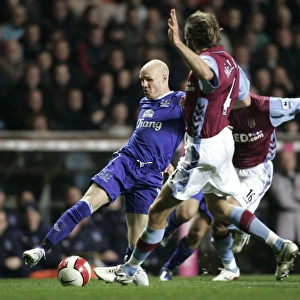 Aston Villa v Everton Andy Johnson in action against Olof Mellberg
