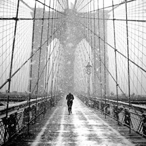 New York Walker in Blizzard - Brooklyn Bridge