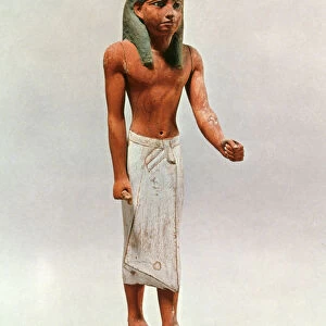 Ancient Egyptian figure of a merchant dignitary