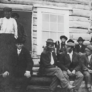Indigenous peoples outside of log building, between c1900 and 1916. Creator: Unknown
